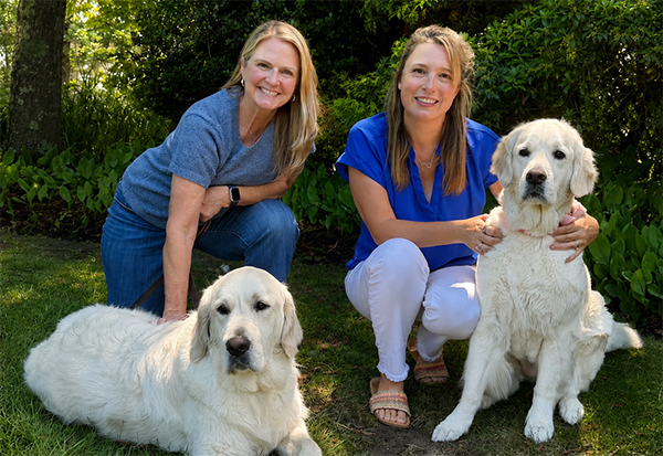 staff-jaime-patti-with-dogs Jaime Rapoza, Office Manager and Patti Ann Farrar, Accounts Payable Specialist